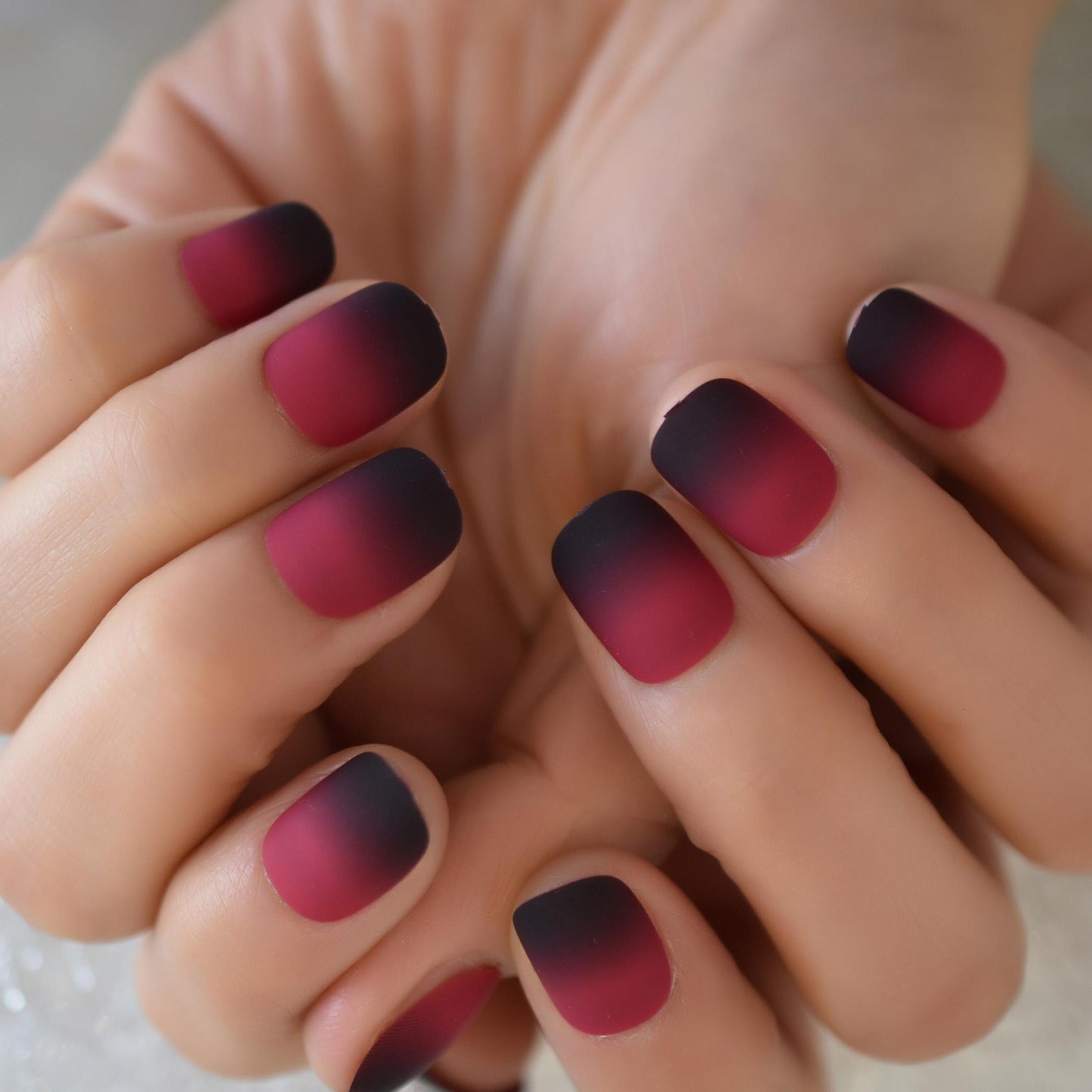 Matte Black And Red Squoval Nails